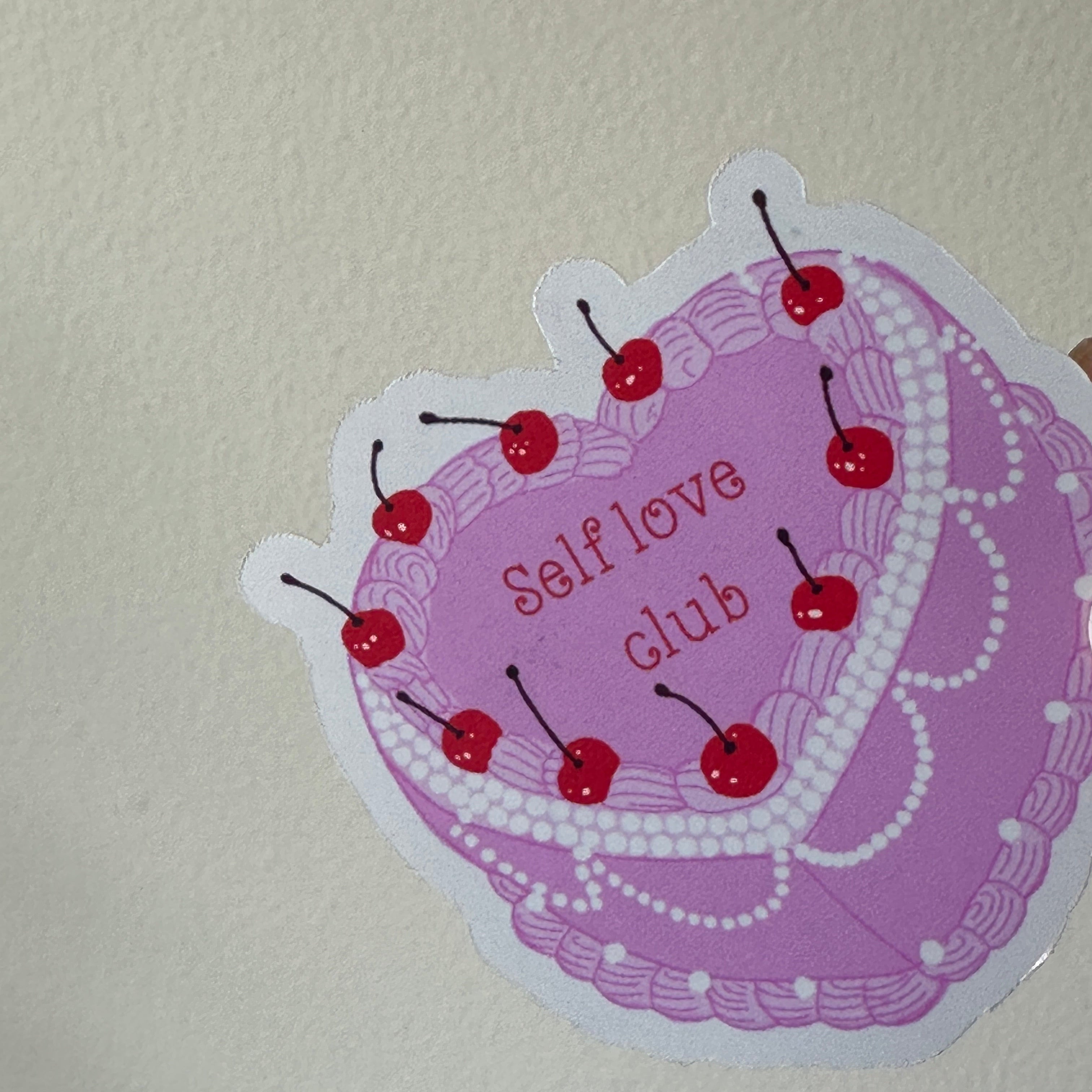 Self Love Club sticker displayed alongside other Ninth Library stickers